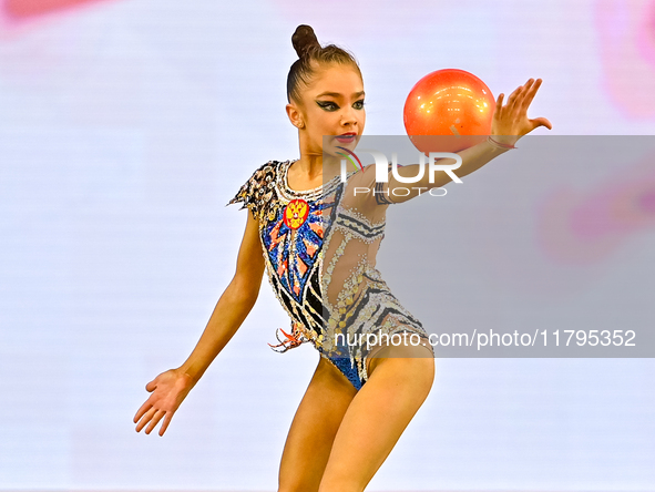 Ksenha Savinova of Russia performs the Ball exercise during the juniors apparatus finals of the International Rhythmic Gymnastics Tournament...