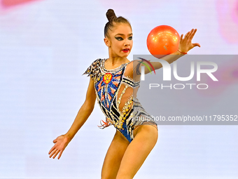 Ksenha Savinova of Russia performs the Ball exercise during the juniors apparatus finals of the International Rhythmic Gymnastics Tournament...