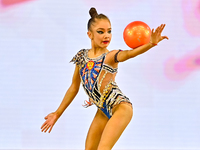 Ksenha Savinova of Russia performs the Ball exercise during the juniors apparatus finals of the International Rhythmic Gymnastics Tournament...