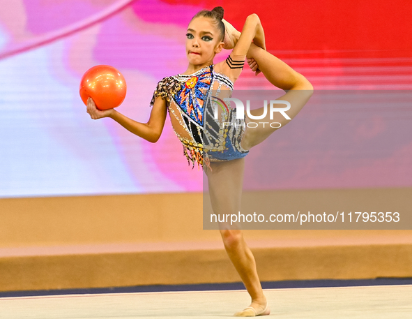 Ksenha Savinova of Russia performs the Ball exercise during the juniors apparatus finals of the International Rhythmic Gymnastics Tournament...