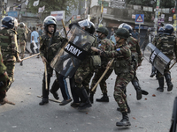 Bangladesh Armed Force personnel arrest picketers amid a clash in Dhaka, Bangladesh, on November 20, 2024. (