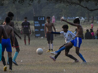 Boys practice football at a ground in Kolkata, India, on October 20, 2024, during a winter afternoon. (