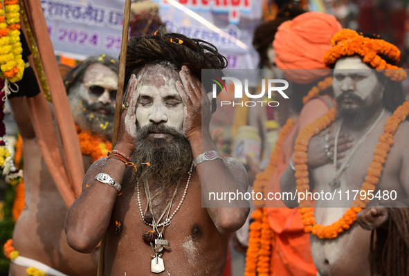 Indian Sadhus (holy men) of Shri Panch Dashnam Juna Akhara participate in a religious procession during the grand Nagar Pravesh ceremony for...