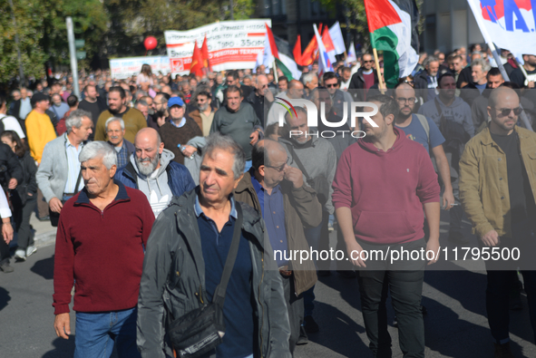 People demonstrate in the streets of Athens, Greece, on November 20, 2024, during a 24-hour nationwide strike called by unions against the r...