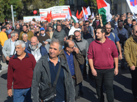 People demonstrate in the streets of Athens, Greece, on November 20, 2024, during a 24-hour nationwide strike called by unions against the r...