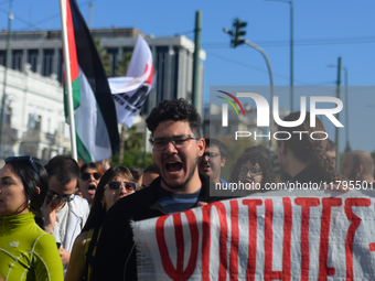 People demonstrate in the streets of Athens, Greece, on November 20, 2024, during a 24-hour nationwide strike called by unions against the r...