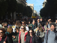 People demonstrate in the streets of Athens, Greece, on November 20, 2024, during a 24-hour nationwide strike called by unions against the r...