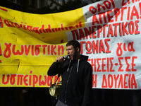 People demonstrate in the streets of Athens, Greece, on November 20, 2024, during a 24-hour nationwide strike called by unions against the r...