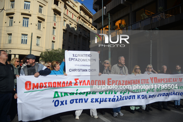 People demonstrate in the streets of Athens, Greece, on November 20, 2024, during a 24-hour nationwide strike called by unions against the r...