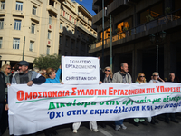 People demonstrate in the streets of Athens, Greece, on November 20, 2024, during a 24-hour nationwide strike called by unions against the r...