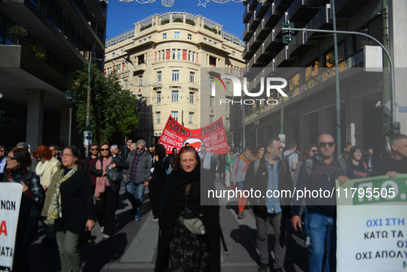 People demonstrate in the streets of Athens, Greece, on November 20, 2024, during a 24-hour nationwide strike called by unions against the r...