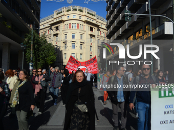 People demonstrate in the streets of Athens, Greece, on November 20, 2024, during a 24-hour nationwide strike called by unions against the r...