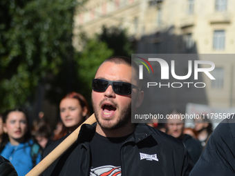 People demonstrate in the streets of Athens, Greece, on November 20, 2024, during a 24-hour nationwide strike called by unions against the r...