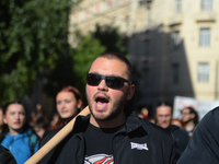 People demonstrate in the streets of Athens, Greece, on November 20, 2024, during a 24-hour nationwide strike called by unions against the r...