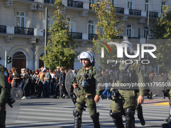 People demonstrate in the streets of Athens, Greece, on November 20, 2024, during a 24-hour nationwide strike called by unions against the r...