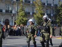 People demonstrate in the streets of Athens, Greece, on November 20, 2024, during a 24-hour nationwide strike called by unions against the r...