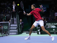 MALAGA, SPAIN - NOVEMBER 20: Gabriel Diallo of Team Canada in his singles match against Daniel Altmaier of Team Germany during the Quarter-F...