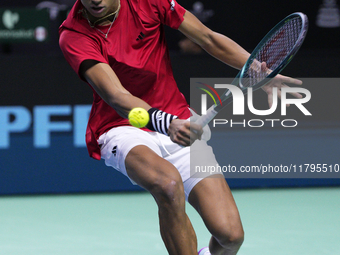 MALAGA, SPAIN - NOVEMBER 20: Gabriel Diallo of Team Canada in his singles match against Daniel Altmaier of Team Germany during the Quarter-F...