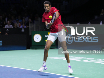 MALAGA, SPAIN - NOVEMBER 20: Gabriel Diallo of Team Canada in his singles match against Daniel Altmaier of Team Germany during the Quarter-F...