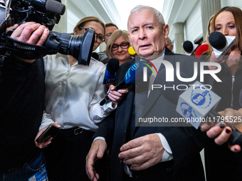 Jaroslaw Kaczynski leader of the Law and Justice party, on his way to a sitting of the Polish Parliament, speaks to journalists in Warsaw, P...