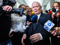 Jaroslaw Kaczynski leader of the Law and Justice party, on his way to a sitting of the Polish Parliament, speaks to journalists in Warsaw, P...