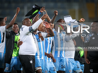 The Botswana team celebrates after qualifying for the Africa Cup of Nations Morocco 25 following a draw in the Africa Cup of Nations Qualifi...