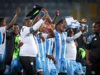 The Botswana team celebrates after qualifying for the Africa Cup of Nations Morocco 25 following a draw in the Africa Cup of Nations Qualifi...