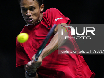 MALAGA, SPAIN - NOVEMBER 20: Gabriel Diallo of Team Canada in his singles match against Daniel Altmaier of Team Germany during the Quarter-F...