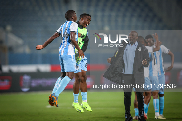 14 Godiraone Modingwane and 6 Gape Mohutsiwa of the Botswana team celebrate after qualifying for the Africa Cup of Nations in Morocco on Jun...