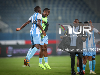 14 Godiraone Modingwane and 6 Gape Mohutsiwa of the Botswana team celebrate after qualifying for the Africa Cup of Nations in Morocco on Jun...