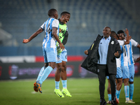 14 Godiraone Modingwane and 6 Gape Mohutsiwa of the Botswana team celebrate after qualifying for the Africa Cup of Nations in Morocco on Jun...