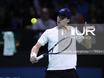 MALAGA, SPAIN - NOVEMBER 20: Daniel Altmaier of Team Germany in his singles match against Gabriel Diallo of Team Canada during the Quarter-F...