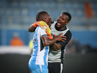 Goitseone Phoko and Godiraone Modingwane of the Botswana team celebrate after qualifying for the Africa Cup of Nations in Morocco on June 25...