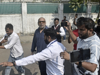 Paresh Rawal, an Indian actor, is seen outside a polling booth after casting his ballot to vote during the Maharashtra state assembly electi...