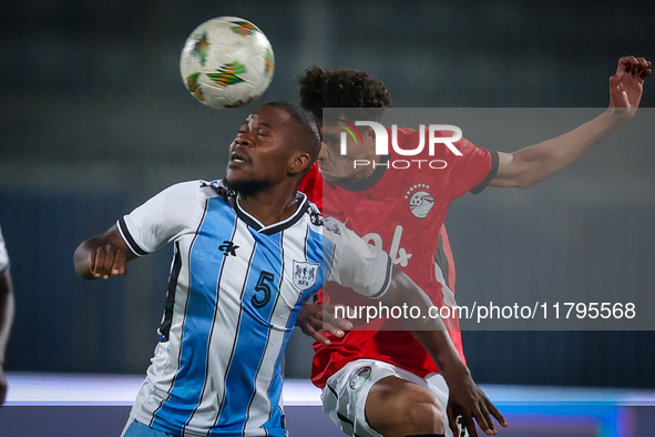 24 Zalaka of the Egypt team battles for possession with 5 Ricky Ratlhogo of the Botswana team during the Africa Cup of Nations Qualifiers ma...