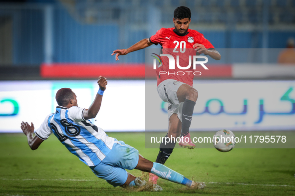 Ibrahim Adel of the Egypt team battles for possession with Lebogang Ditsele of the Botswana team during the Africa Cup of Nations Qualifiers...