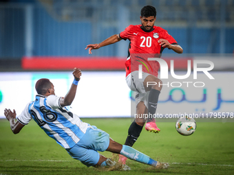 Ibrahim Adel of the Egypt team battles for possession with Lebogang Ditsele of the Botswana team during the Africa Cup of Nations Qualifiers...