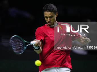 MALAGA, SPAIN - NOVEMBER 20: Gabriel Diallo of Team Canada in his singles match against Daniel Altmaier of Team Germany during the Quarter-F...