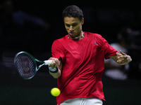 MALAGA, SPAIN - NOVEMBER 20: Gabriel Diallo of Team Canada in his singles match against Daniel Altmaier of Team Germany during the Quarter-F...