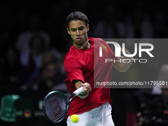 MALAGA, SPAIN - NOVEMBER 20: Gabriel Diallo of Team Canada in his singles match against Daniel Altmaier of Team Germany during the Quarter-F...