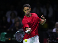 MALAGA, SPAIN - NOVEMBER 20: Gabriel Diallo of Team Canada in his singles match against Daniel Altmaier of Team Germany during the Quarter-F...