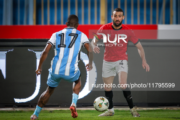 Omar Kamal of the Egypt team battles for possession with Chicco Molefe of the Botswana team during the Africa Cup of Nations Qualifiers matc...