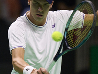 MALAGA, SPAIN - NOVEMBER 20: Daniel Altmaier of Team Germany in his singles match against Gabriel Diallo of Team Canada during the Quarter-F...