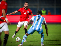 Omar Kamal of the Egypt team battles for possession with Kabelo Seakanyeng of the Botswana team during the Africa Cup of Nations Qualifiers...