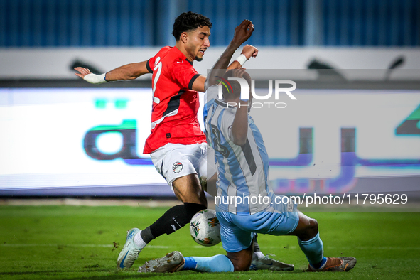 Omar Marmoush of the Egypt team battles for possession with Olebogeng Ramotse of the Botswana team during the Africa Cup of Nations Qualifie...