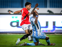 Omar Marmoush of the Egypt team battles for possession with Olebogeng Ramotse of the Botswana team during the Africa Cup of Nations Qualifie...