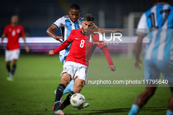 Nasser Maher of the Egypt team battles for possession with Omaatla Kebatho of the Botswana team during the Africa Cup of Nations Qualifiers...