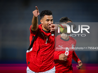 Mahmoud Trezeguet of the Egypt team celebrates after scoring the first goal during the Africa Cup of Nations Qualifiers match between Egypt...