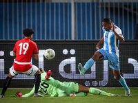 Mostafa Shobeir of the Egypt team battles for possession with Omaatla Kebatho of the Botswana team during the Africa Cup of Nations Qualifie...