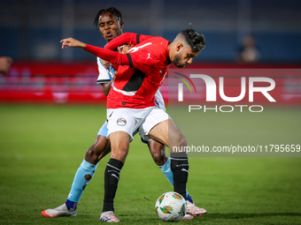 Nasser Maher of the Egypt team battles for possession with Kabelo Seakanyeng of the Botswana team during the Africa Cup of Nations Qualifier...